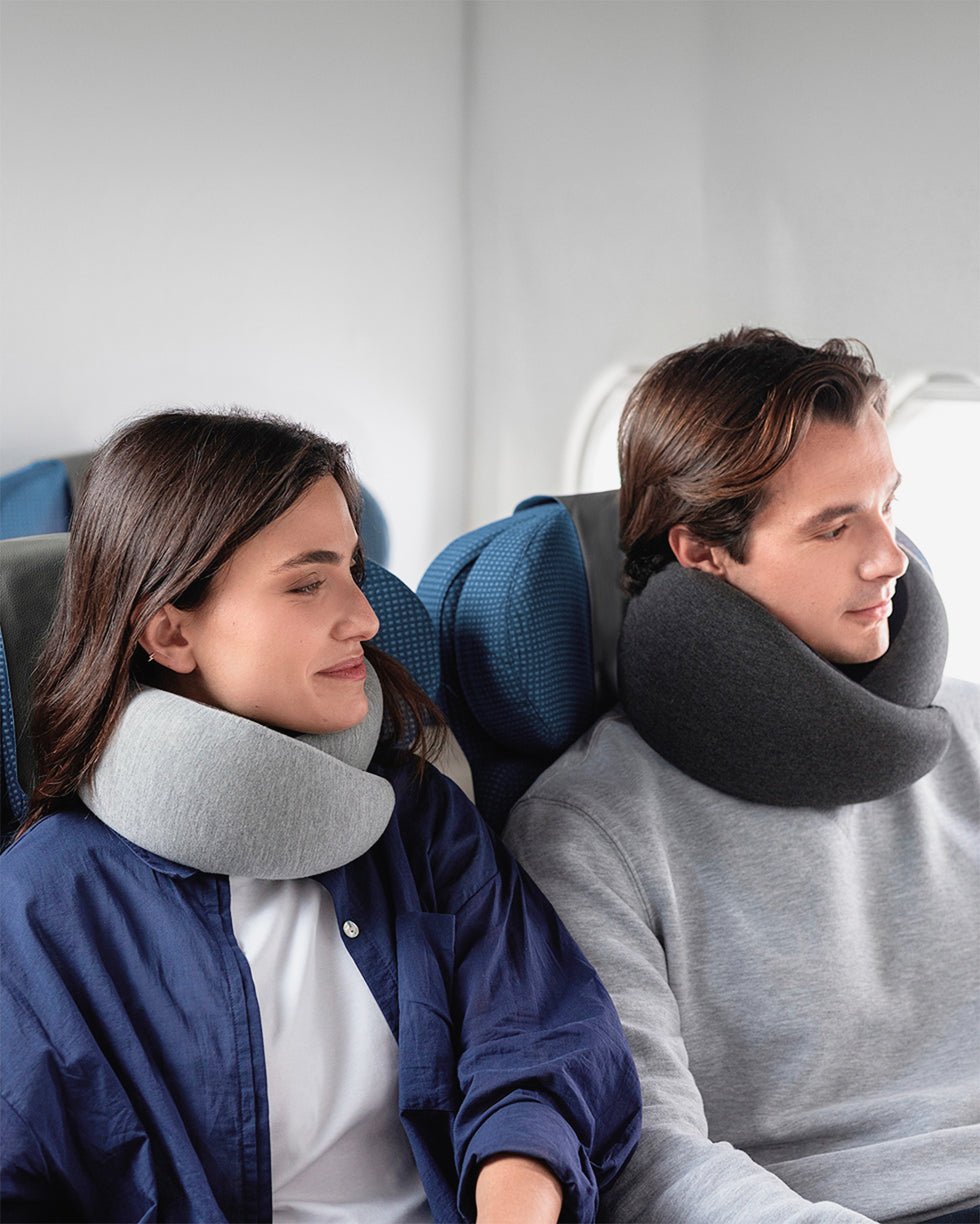 Traveler sleeping comfortably with the 360 travel neck pillow